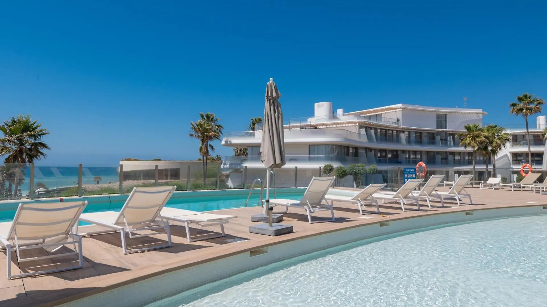 Edge Luxury Beachfront 2Br With 3 Pools, Wellness, Gym contacts